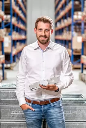 A RAMPA employee from the plastic and metal sales team is shown.