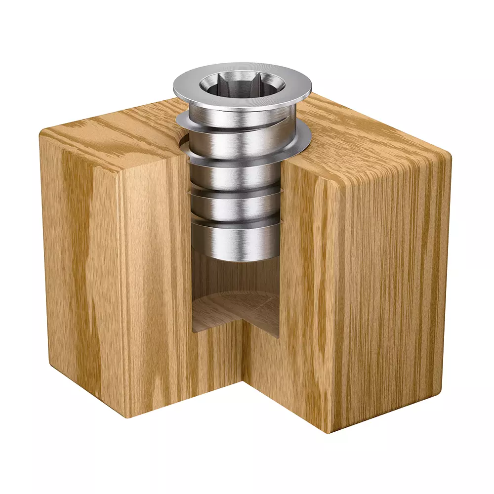 RAMPA-Muffen finden in Holz und Holzwerkstoffen Anwendung. Dies zeigt der Querschnitt eines Holzblockes, in dem eine RAMPA-Muffe verarbeitet ist.